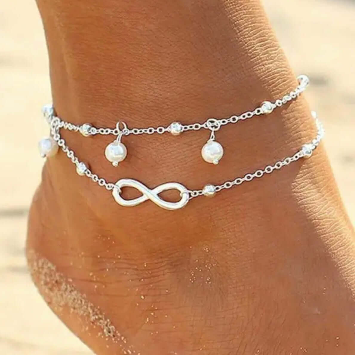 Strahlen Sie mit dem Sommer: Fußkettchen mit Perlen und Unendlichkeitssymbol - IRIS AURA SHOP