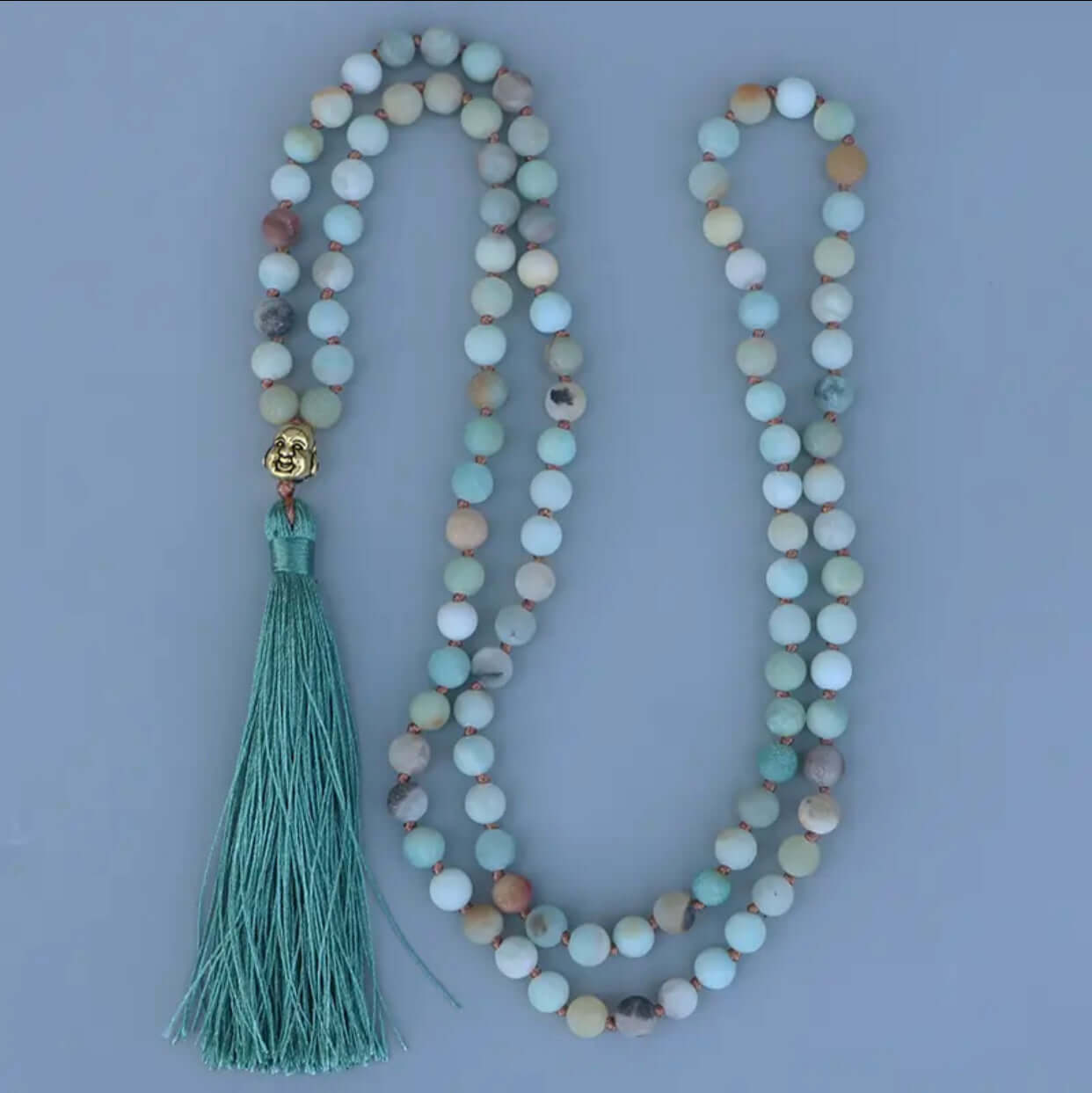 Mala-Halskette mit Amazonit & Buddha: Ein Symbol für Ruhe und Ausgeglichenheit
